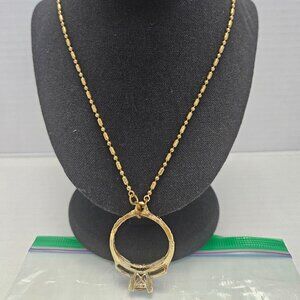 9 INCH GOLD TONE NECKLACE, WITH LARGE "DIAMOND" RING CHARM